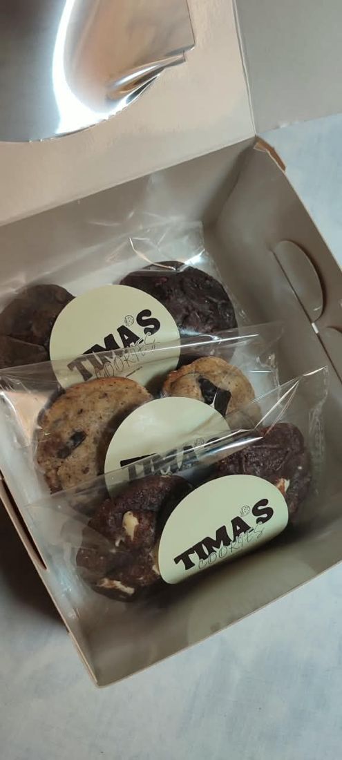 Cookies wrapped in bags with Tima's stickers
